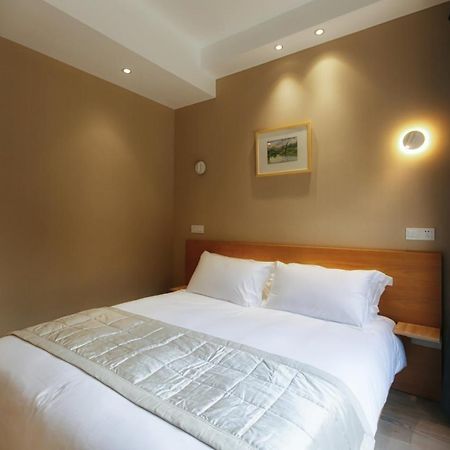 Pin Cheng Hotel Hangzhou Bagian luar foto